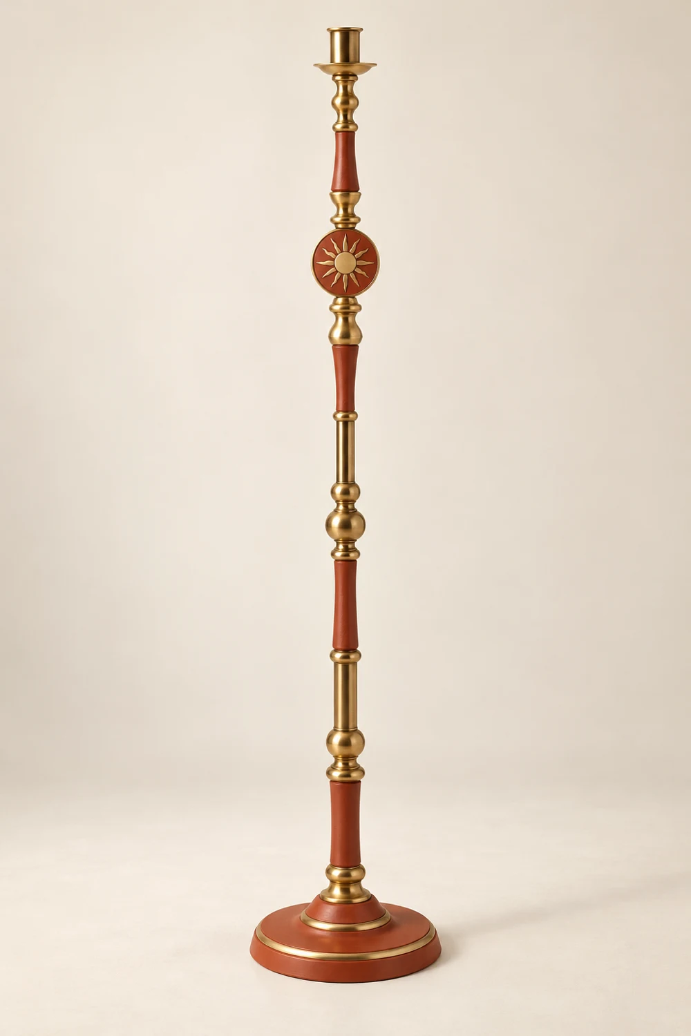 Sienna Sun painted brass floor candle holder, Terracotta & gold